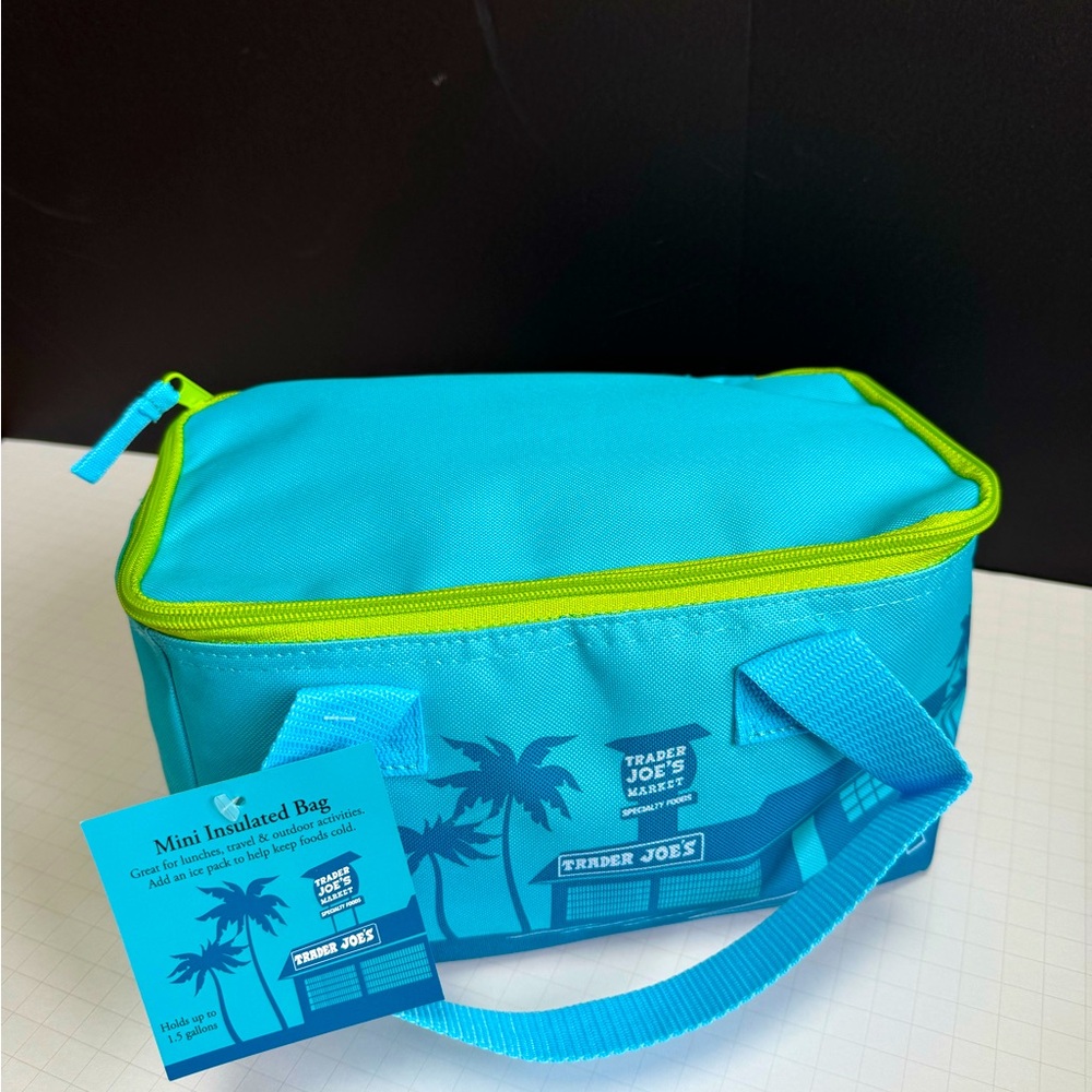 Trader Joe’s mini insulated lunch tote. 1.5 gallons blue.New with tags.
